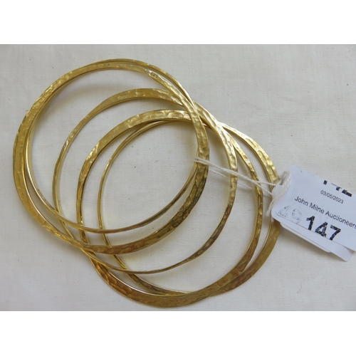 147 - Five Italian Silver Gilt Bangles