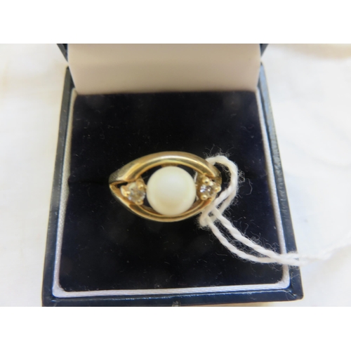 150 - 14ct Gold Pearl and Diamond Dress Ring