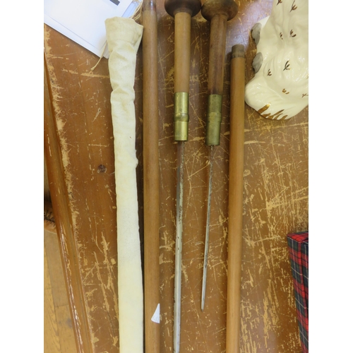 346 - Two Brass Bound Sword Sticks