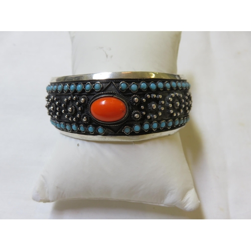 119 - Vintage South American Silver Wide Bracelet with turquoise and orange centre stones