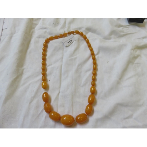 117 - String of Graduated Amber style Beads