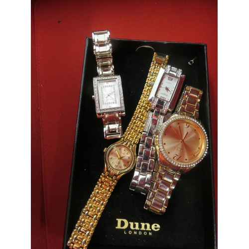 259 - Four Ladies Wrist Watches and Jewellery Bag