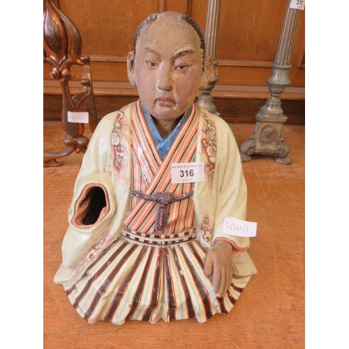 316 - Oriental ceramic figure with nodding head