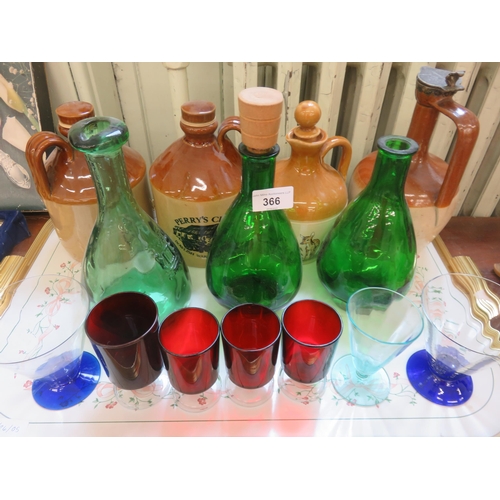 366 - Four Pottery Bottles (one with Silver Cap), three Green Glass Bottles and Seven Coloured Glasses