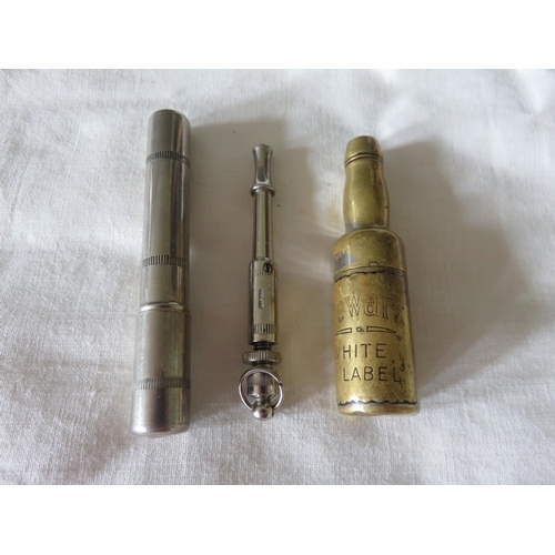 53 - Advertising Bottle Shaped Corkscrew and a Vintage Dog Whistle