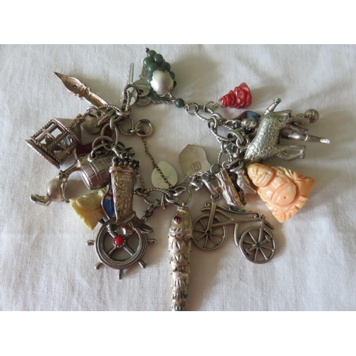 59 - Continental Silver Charm Bracelet 75g