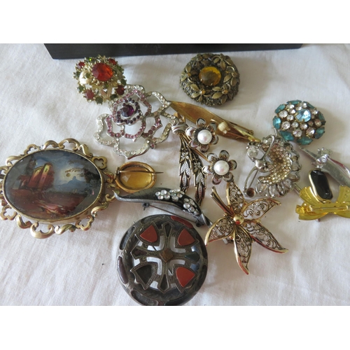 63 - Quantity of Brooches