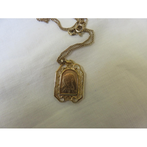 67 - 9ct. Gold Virgin Mary Pendant on chain, 4 grams