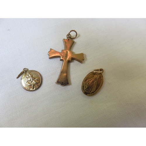 75 - Three 9ct. Gold Religious Pendants 4.1 grams