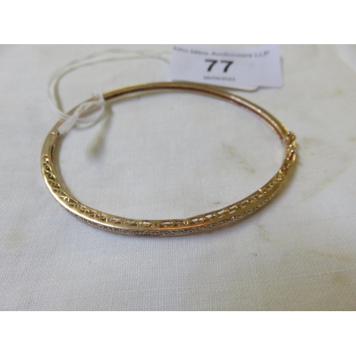 77 - 14ct. Yellow Gold and Diamond set Bangle