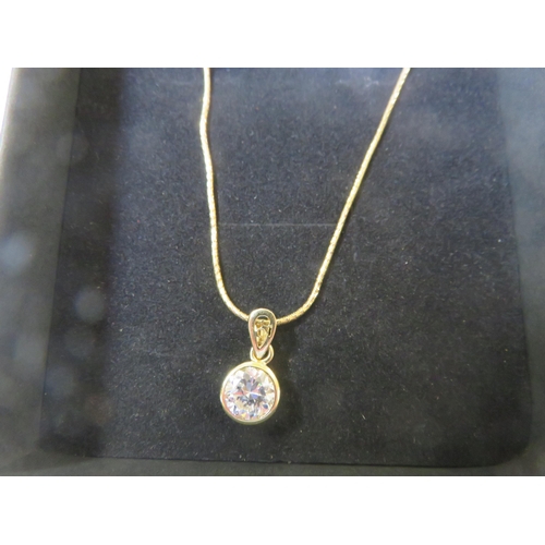 78 - 18ct. Gold and White Stone Pendant on chain