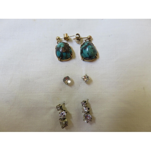 82 - Three Pairs of Gold and Silver Earrings