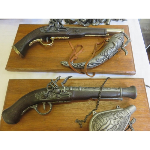 319 - Two Wall Mounted Pistols and Powder Flasks and Deep Shaped Wall Mounted