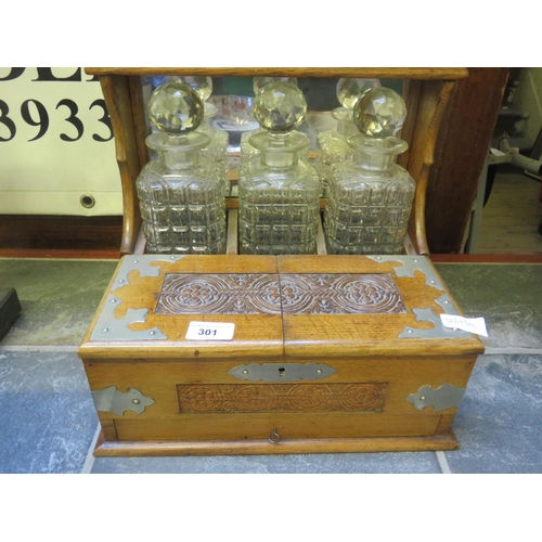 301 - Carved Oak Three Decanter Tantalus