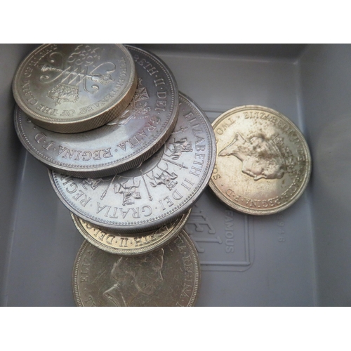 113 - Two £5 coins, four £2 coins