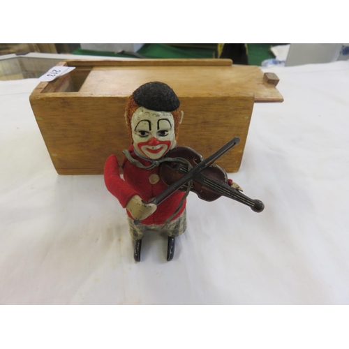 213 - Tin Plate wind-up Violinist Toy