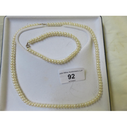 92 - Fresh Water Pearl Necklace and Bracelet Set stamped 10k in fitted Finnies Box