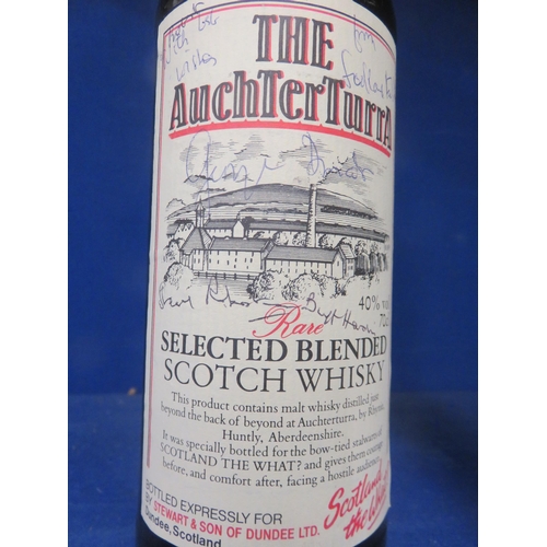 77 - Bottle of Auchterturra Whisky, signed by Scotland the What Cast