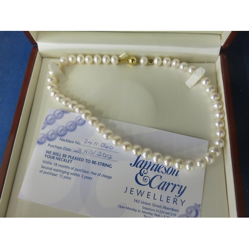 87 - Boxed Jamieson and Carry String of Pearls with 18ct Gold Clasp