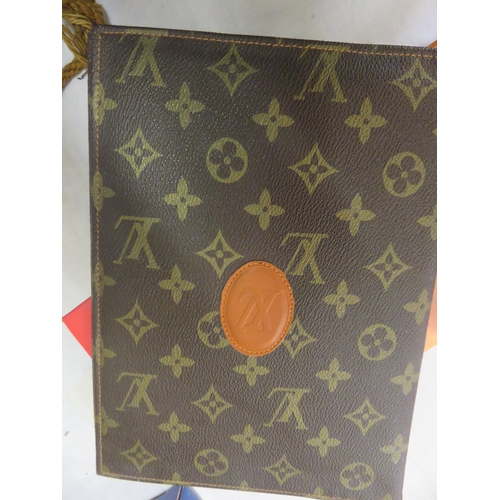 327 - Louis Vuitton Oversized Wallet