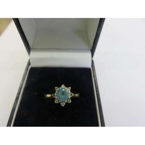 117 - 18ct Gold and Blue Stone Diamond Chip Ring