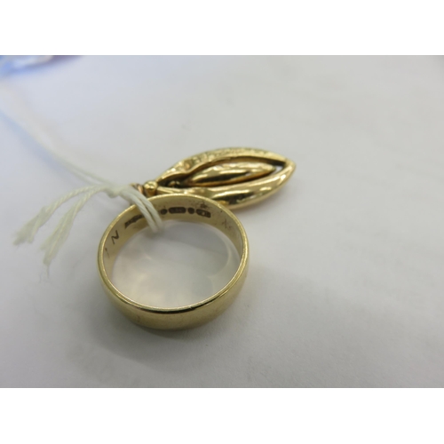 124 - 9ct. Gold Wedding Band and Pendant, 3.6g