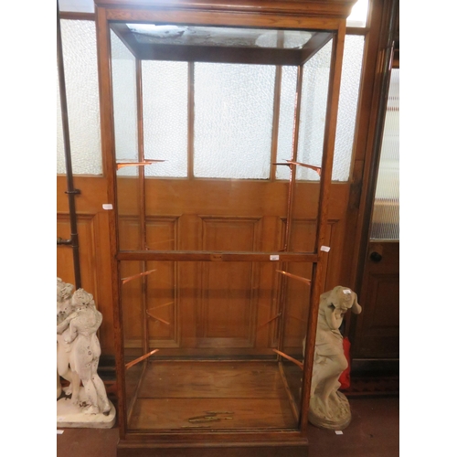 497 - Very large, ex Rubber shop glazed display case with 3 glass tiers