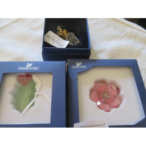 94 - Three Boxed Swarovski Pendant A9400 NR000102/Pink Flower A9400 NR000219/Potted Plant A9460 NR000075