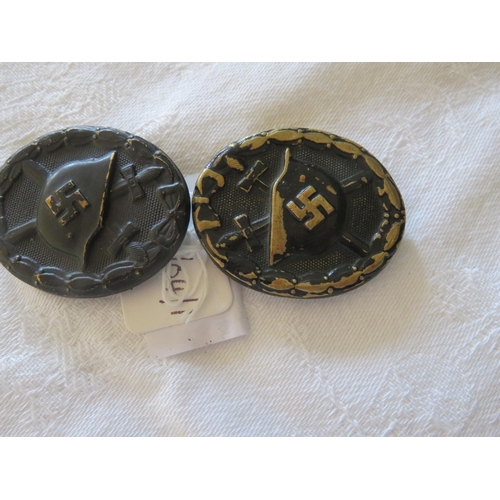 97 - Two German WWII Wound Badges