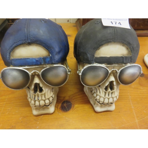 174 - Pair of Novelty Skulls