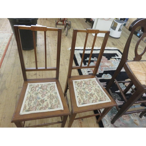 437 - Pair of Mahogany Chairs with embroidered seats