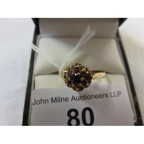 80 - 9ct Gold And Garnet Dress Ring