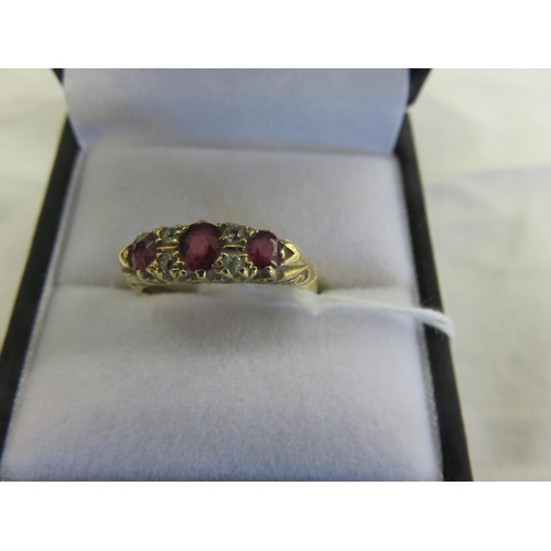 113 - 18ct. Gold Ruby and Diamond Dress Ring