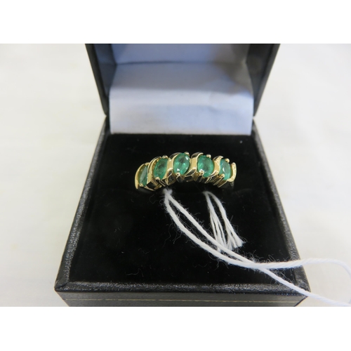 118 - 9ct. Gold and Emerald type five stone ring