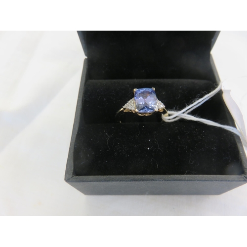 120 - 14ct. Gold and Tanzanite type Dress Ring