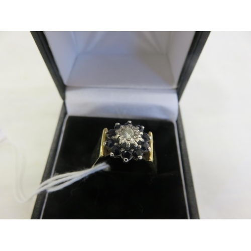 131 - 18ct. Yellow Gold Sapphire and Diamond Cluster Ring