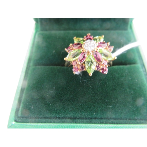 136 - 9ct. Gold Cluster Ring with Amethyst and Peridot Coloured Stones