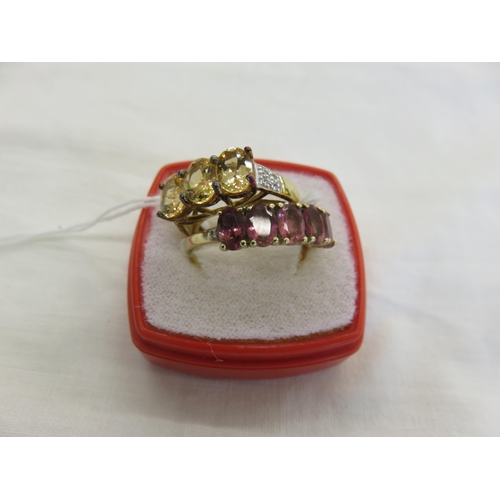 138 - Two odd 9ct. Gold Ruby and Diamond Dress Rings