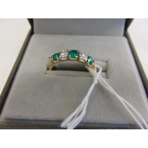 153 - 18ct. Gold Emerald and Diamond five stone ring