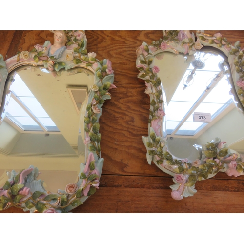 373 - Pair of continental Style Figural Mirrors