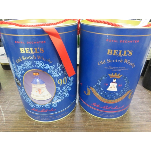 421 - Two boxed Bells Decanters