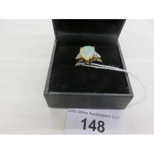 148 - 9ct. Gold and Opal type Dress Ring