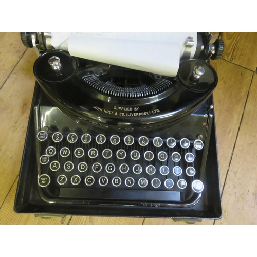 334 - Cased Remington Portable Typewriter