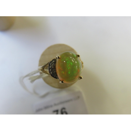 76 - 9ct. Gold Opal type Dress Ring