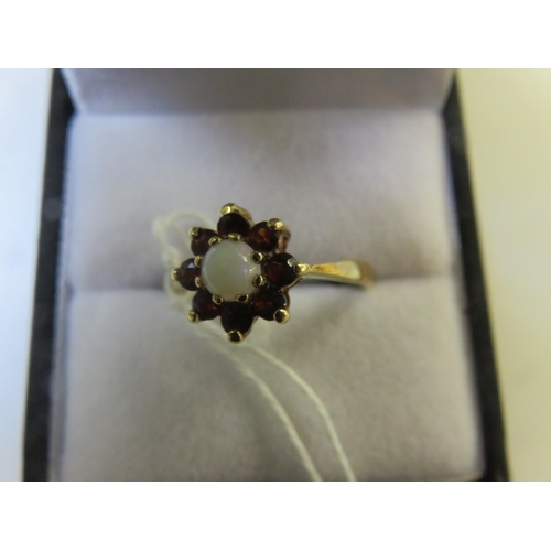 89 - 9ct. Gold Opal and Garnet type Dress Ring