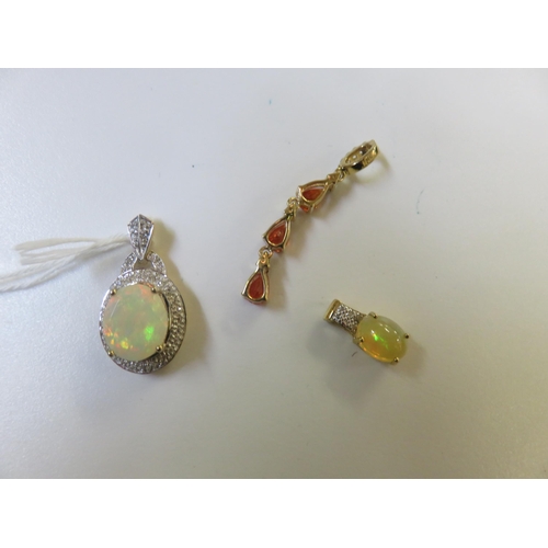 95 - Two 9ct. Gold and Opal style Pendants