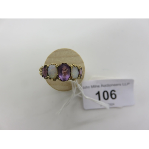 106 - 9ct. Gold Opal and Amethyst Ring