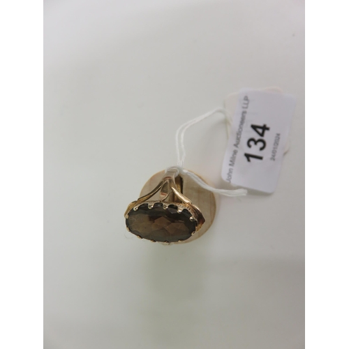 134 - 9ct. Gold and Smokey Quartz Dress Ring