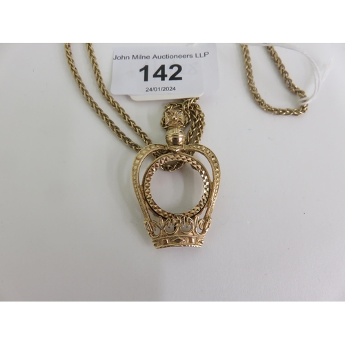 142 - 9ct. Crown Shaped Coin mount on 9ct. Gold Chain. 20.1 grams