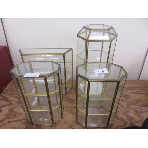 179 - Four assorted shaped small display cases